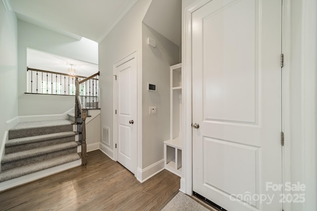 2004 Viscount Dr, Matthews, NC 28104 - mudroom featuring wood finished floors and crown molding