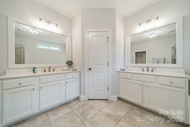 2004 Viscount Dr, Matthews, NC 28104 - bathroom with two vanities and tile patterned flooring
