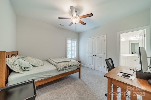 2004 Viscount Dr, Matthews, NC 28104 - bedroom featuring a desk, light carpet, a closet, a ceiling fan, and connected bathroom