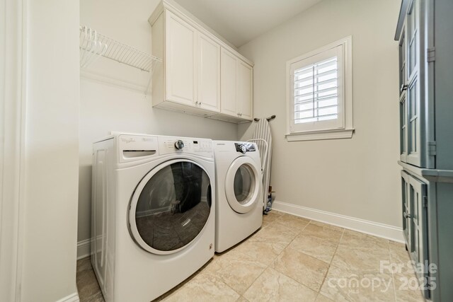 2004 Viscount Dr, Matthews, NC 28104 - laundry room featuring washer and clothes dryer and cabinet space