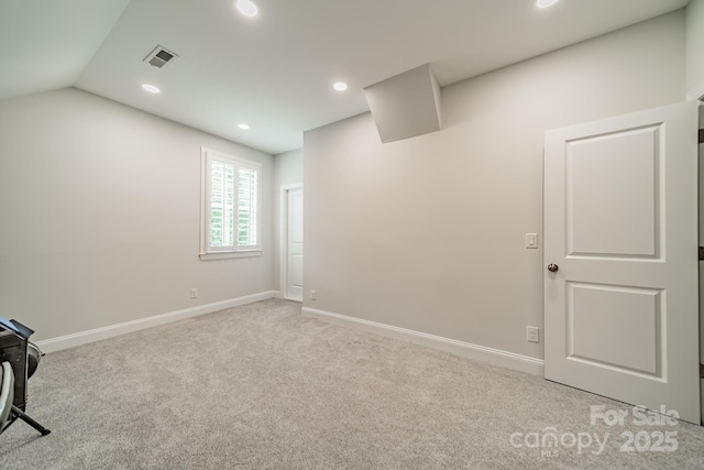 2004 Viscount Dr, Matthews, NC 28104 - empty room featuring carpet, recessed lighting, and vaulted ceiling