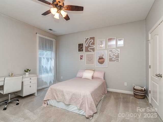 314 Candella Dr, Matthews, NC 28104 - bedroom featuring light carpet, ceiling fan, and baseboards