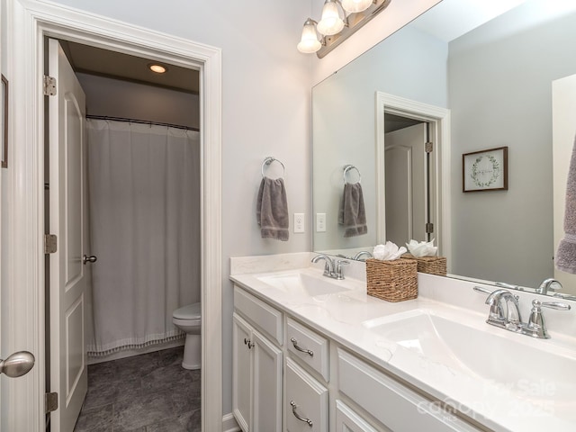 314 Candella Dr, Matthews, NC 28104 - bathroom featuring double vanity, toilet, and a shower with curtain