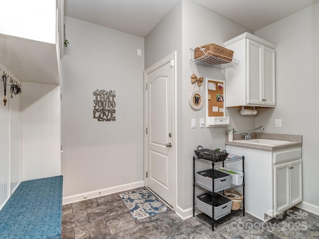 314 Candella Dr, Matthews, NC 28104 - interior space featuring a sink, baseboards, and stone finish flooring