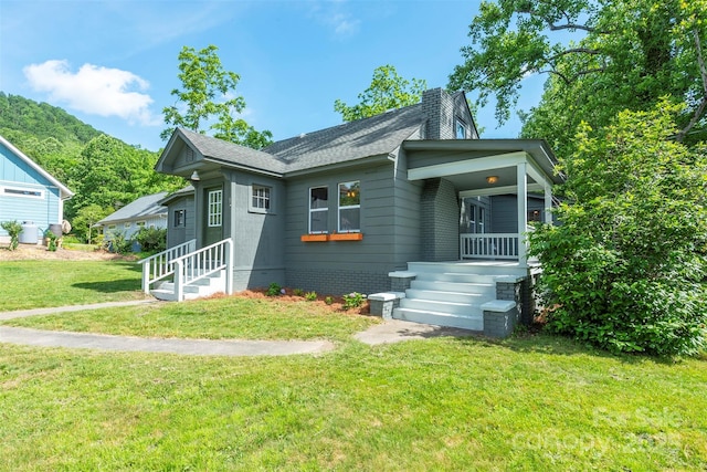 12 Mountain View Ave, Black Mountain, NC 28711 - bungalow-style house with a front lawn and roof with shingles