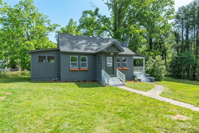 12 Mountain View Ave, Black Mountain, NC 28711 - bungalow-style home with a front lawn and roof with shingles