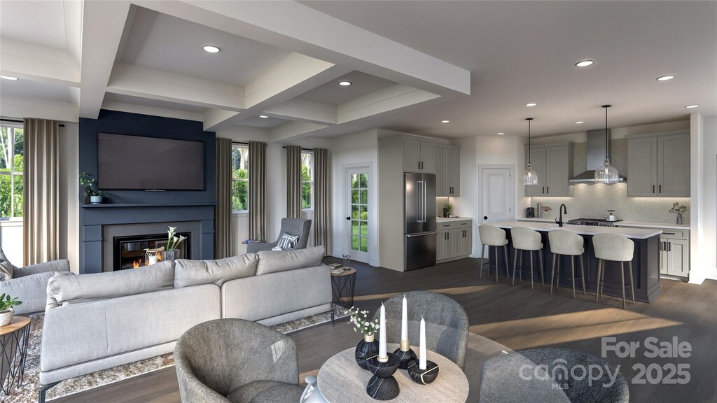 309 S Gardner Ave, Charlotte, NC 28208 - living area featuring dark wood finished floors, coffered ceiling, recessed lighting, a fireplace, and beam ceiling