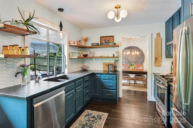 19 Poplar Ct, Hendersonville, NC 28792 - kitchen featuring appliances with stainless steel finishes, open shelves, dark countertops, and a chandelier