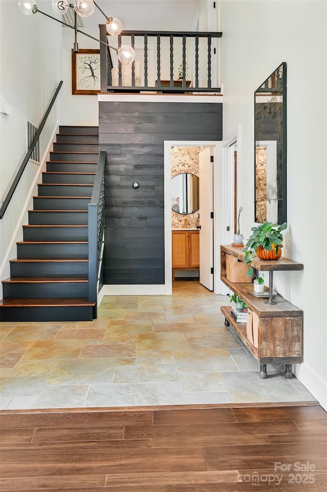 19 Poplar Ct, Hendersonville, NC 28792 - foyer entrance featuring stairway and a towering ceiling