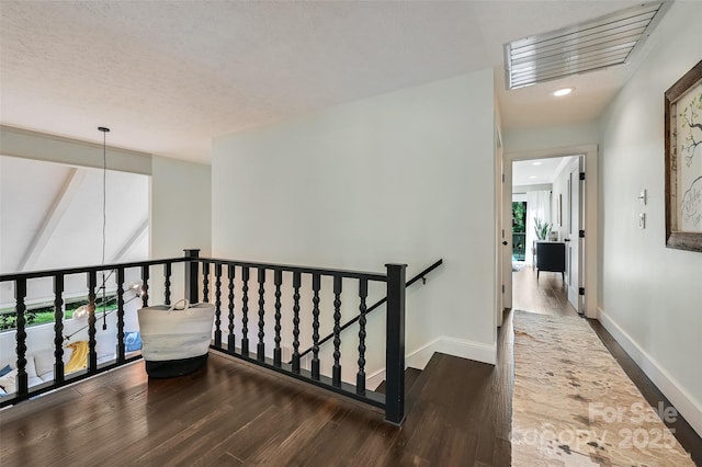 19 Poplar Ct, Hendersonville, NC 28792 - hallway featuring dark wood-style floors, an upstairs landing, and recessed lighting