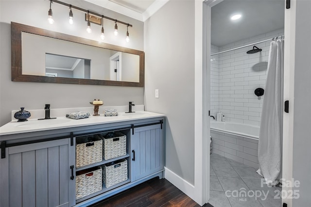 19 Poplar Ct, Hendersonville, NC 28792 - bathroom featuring double vanity, ornamental molding, tiled shower / bath combo, and wood finished floors