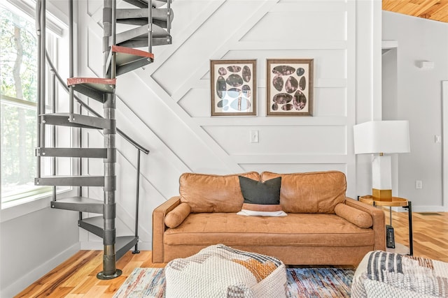 163 Hawk Hollow Dr, Lake Lure, NC 28746 - living area featuring stairs, healthy amount of natural light, and wood finished floors
