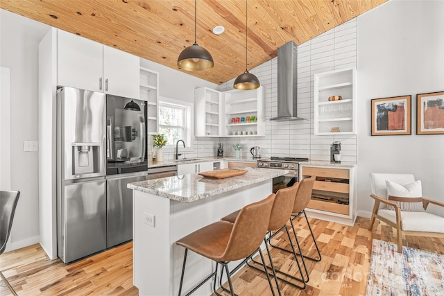163 Hawk Hollow Dr, Lake Lure, NC 28746 - kitchen featuring open shelves, appliances with stainless steel finishes, wall chimney exhaust hood, wood ceiling, and light wood finished floors