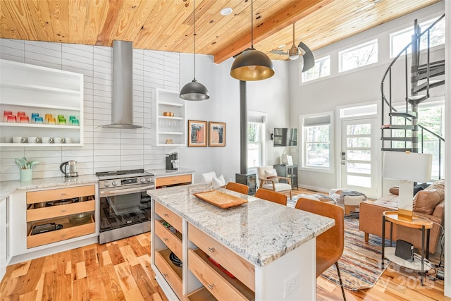 163 Hawk Hollow Dr, Lake Lure, NC 28746 - kitchen with stainless steel range, wall chimney exhaust hood, wooden ceiling, open shelves, and light wood finished floors