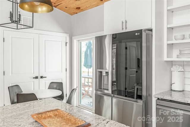 163 Hawk Hollow Dr, Lake Lure, NC 28746 - kitchen featuring stainless steel appliances, white cabinets, light stone countertops, and open shelves