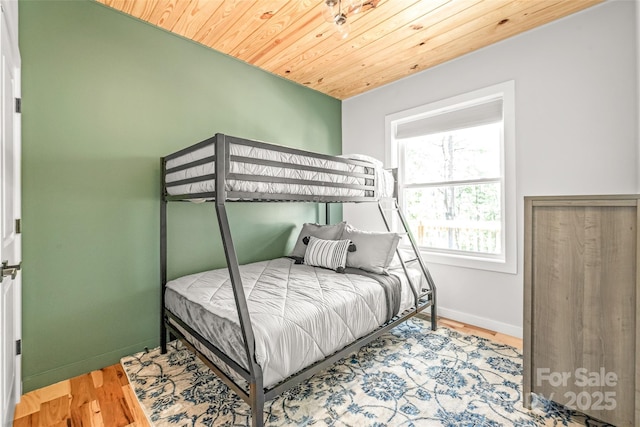 163 Hawk Hollow Dr, Lake Lure, NC 28746 - bedroom with wooden ceiling and wood finished floors