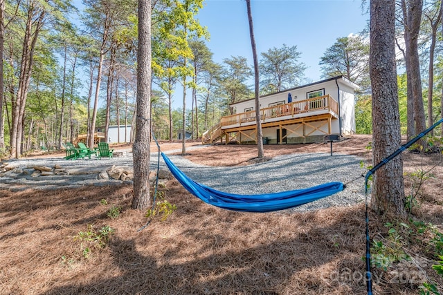 163 Hawk Hollow Dr, Lake Lure, NC 28746 - back of house featuring a deck, stairs, and an outdoor structure