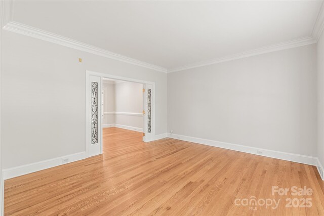 7301 Leharne Dr, Charlotte, NC 28270 - spare room with ornamental molding and light wood-style flooring