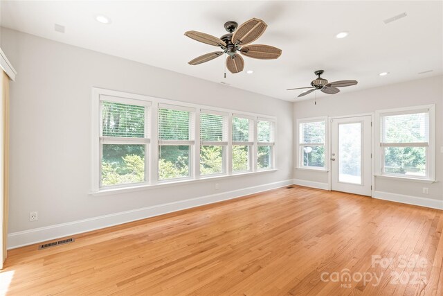 7301 Leharne Dr, Charlotte, NC 28270 - empty room with light wood finished floors, recessed lighting, and ceiling fan