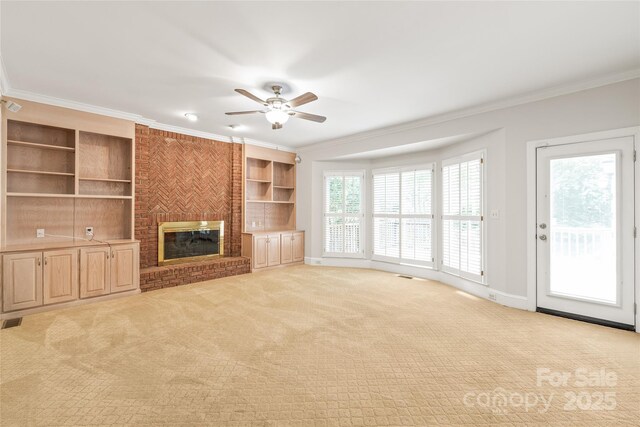 7301 Leharne Dr, Charlotte, NC 28270 - unfurnished living room with crown molding, a ceiling fan, light carpet, and a fireplace