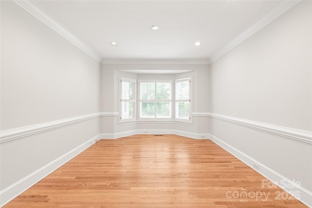 7301 Leharne Dr, Charlotte, NC 28270 - spare room with light wood finished floors, recessed lighting, and crown molding