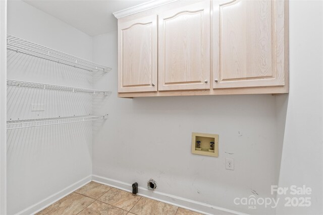 7301 Leharne Dr, Charlotte, NC 28270 - laundry room with hookup for a washing machine, cabinet space, and tile patterned flooring