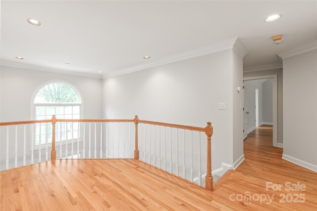 7301 Leharne Dr, Charlotte, NC 28270 - corridor with an upstairs landing, wood finished floors, recessed lighting, and ornamental molding