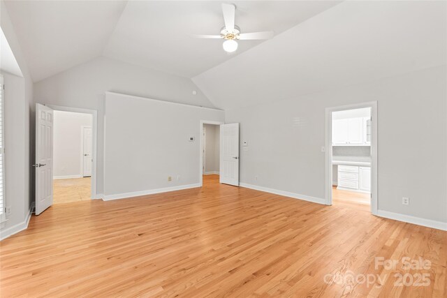 7301 Leharne Dr, Charlotte, NC 28270 - unfurnished living room with a ceiling fan, light wood-type flooring, and lofted ceiling