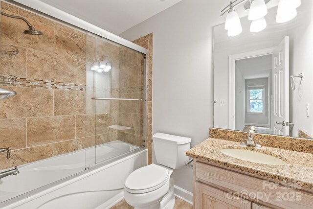 7301 Leharne Dr, Charlotte, NC 28270 - bathroom featuring vanity and enclosed tub / shower combo