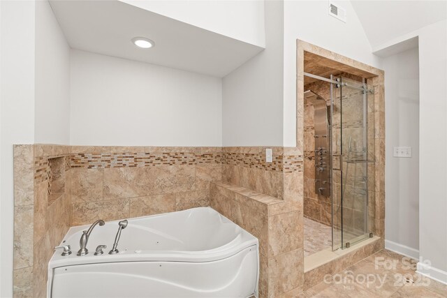 7301 Leharne Dr, Charlotte, NC 28270 - full bathroom featuring a tub with jets and a stall shower