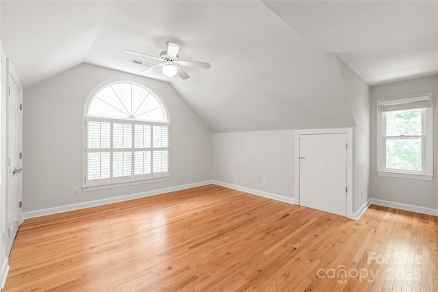 7301 Leharne Dr, Charlotte, NC 28270 - additional living space featuring light wood-type flooring, lofted ceiling, and a ceiling fan