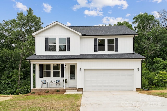 384 Speedway Pl, Concord, NC 28027 - view of front of property featuring covered porch, an attached garage, concrete driveway, and a shingled roof