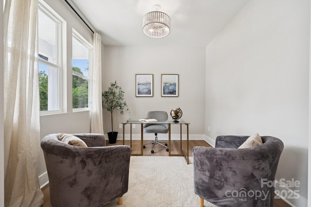 384 Speedway Pl, Concord, NC 28027 - office area featuring wood finished floors and a chandelier