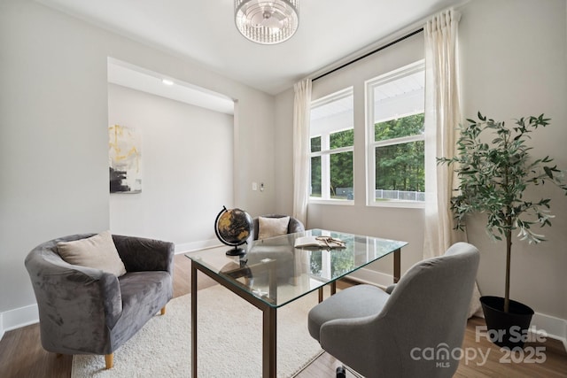384 Speedway Pl, Concord, NC 28027 - office with wood finished floors and a chandelier