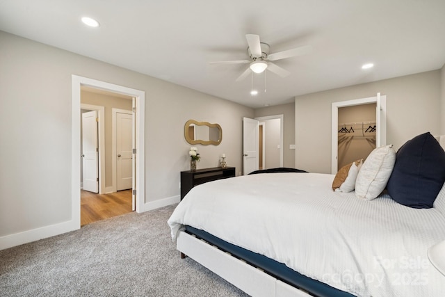 384 Speedway Pl, Concord, NC 28027 - bedroom featuring carpet floors, a walk in closet, recessed lighting, a ceiling fan, and a closet