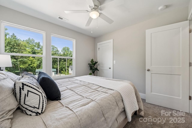 384 Speedway Pl, Concord, NC 28027 - carpeted bedroom with ceiling fan and baseboards