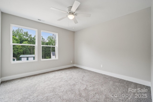 384 Speedway Pl, Concord, NC 28027 - carpeted spare room with baseboards and a ceiling fan