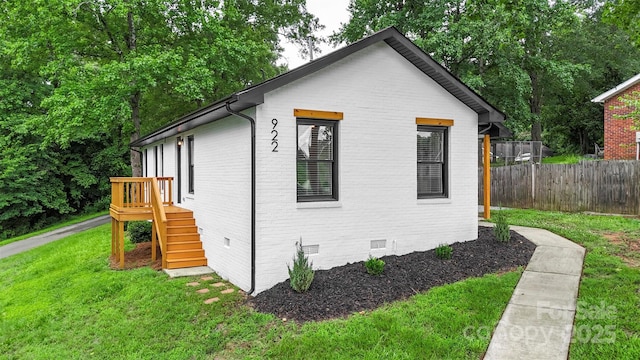 922 Maurice St, Monroe, NC 28112 - view of home's exterior with crawl space and brick siding