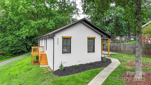 922 Maurice St, Monroe, NC 28112 - view of side of home featuring crawl space and brick siding