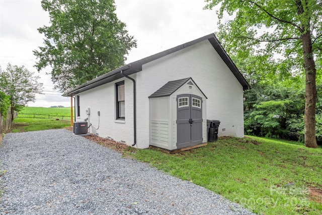 922 Maurice St, Monroe, NC 28112 - view of home's exterior featuring brick siding and driveway