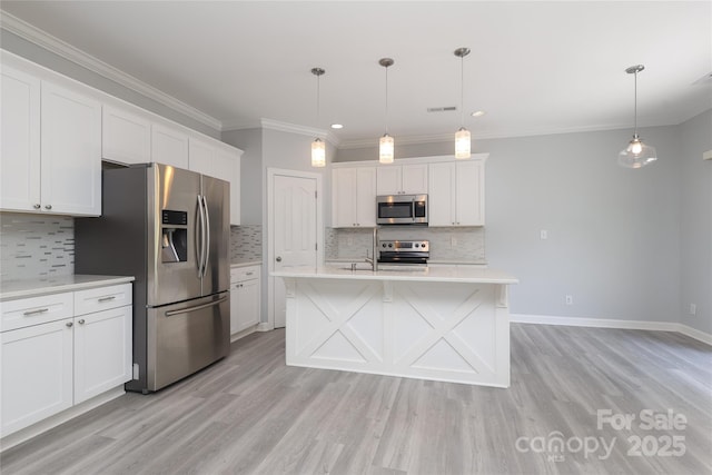 12321 Aquitaine St, Charlotte, NC 28277 - kitchen featuring stainless steel appliances, light countertops, tasteful backsplash, white cabinetry, and light wood-type flooring