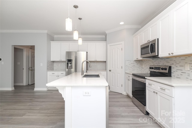 12321 Aquitaine St, Charlotte, NC 28277 - kitchen with stainless steel appliances, crown molding, light countertops, hanging light fixtures, and backsplash