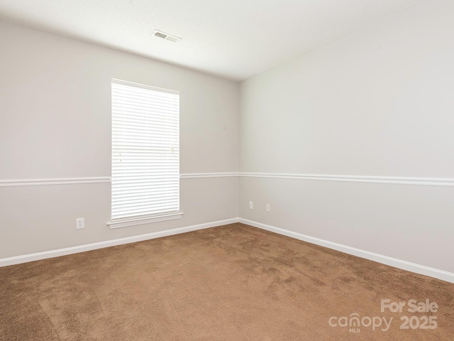 703 Bradberry Ln, Indian Trail, NC 28079 - carpeted spare room featuring healthy amount of natural light