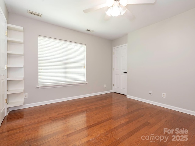 703 Bradberry Ln, Indian Trail, NC 28079 - unfurnished room featuring ceiling fan and wood finished floors