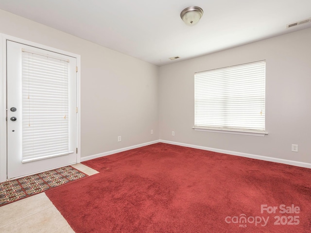 703 Bradberry Ln, Indian Trail, NC 28079 - carpeted empty room with baseboards