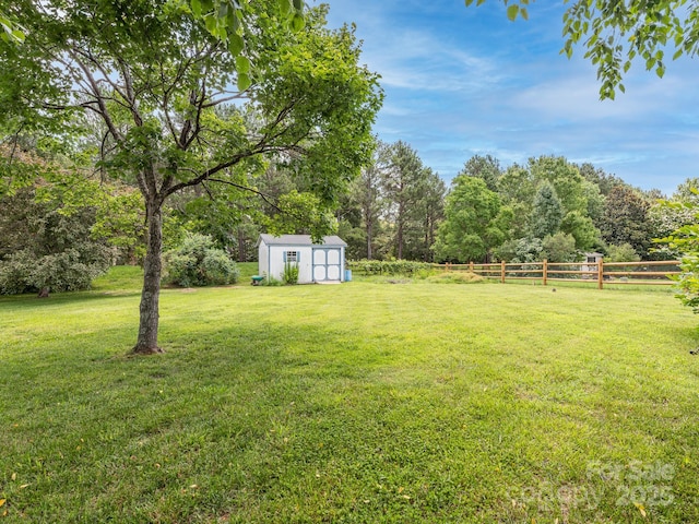 703 Bradberry Ln, Indian Trail, NC 28079 - view of yard with a storage shed