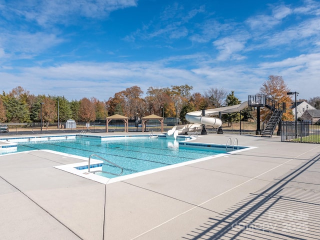 703 Bradberry Ln, Indian Trail, NC 28079 - community pool with a water slide, a gazebo, and a patio area
