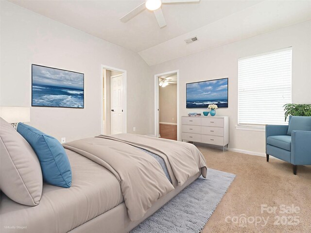703 Bradberry Ln, Indian Trail, NC 28079 - bedroom featuring carpet flooring, vaulted ceiling, and ceiling fan