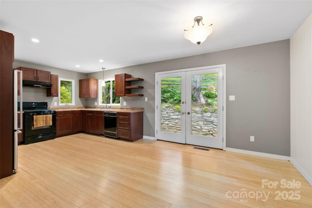 155 Old Starnes Cove Rd, Asheville, NC 28806 - kitchen featuring black appliances, under cabinet range hood, french doors, open shelves, and light countertops
