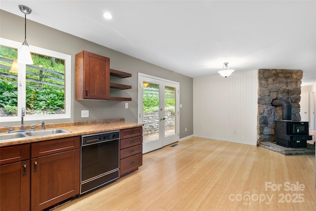 155 Old Starnes Cove Rd, Asheville, NC 28806 - kitchen featuring black dishwasher, light wood finished floors, a wood stove, french doors, and open shelves